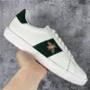 2023 New high quality men's and women's casual shoes fashion green red stripes black leather embroidery small accessories