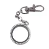 Porte-clés 1pcs 30mm alliage rond flottant charme médaillon porte-clés torsion vivant mémoire verre porte-clés bijoux accessoires