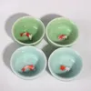 Tazas de té de porcelana china, taza de KungFu de cerámica china de 50ml, Celadon Azure/verde, carpa creativa, pez dorado, taza de té pequeña, venta al por mayor