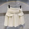 2023 novo preto sexy rua casual designer saias femininas de cintura alta metal letra d pingente para evitar luz fora mini saia