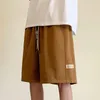 Shorts masculinos branco ligeiramente elástico cintura média baixa verão luz e fina quinta calças soltas esportes casuais moda na moda