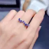 Bagues de cluster 925 Argent Luxe Mode Fil torsadé Plein Zircon Simulation Spinelle Bleu Bague Fermée Dames Fête D'anniversaire Bijoux Cadeau