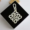 design Unique geometric hollowing keychain delicate multi-color bag charm pendantUNB9