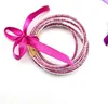 Braccialetti con ciondoli Bracciale in gelatina di silicone di moda per le donne Gioielli per coppie di ragazze di Buddha con fiocco di colore brillante a 5 strati