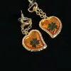Designerörhängen SL Luxury Top Women's Love Clover Orange Pendant Versatile Temperament Ny Silver Needle Earrings Accessories Valentine's Day Gifts SMEEDDICE