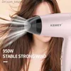 Kemei Poignée portative Sèche-cheveux compact Pliable Sèche-cheveux à faible bruit Vent chaud Longue durée de vie pour les voyages en plein air 950W Utilisation étudiante Q230828