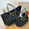 Neue Luxus -Strohhalm Strandtaschen Geldbörse Designer Schulter -Strick -Schifffahrtsmarke Mode Luxus Black Crossbody Taschen Buchstaben Bucket Frauen Vintage -Taschen Handtaschen zwei Größe