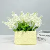 花瓶の豪華なハンドバッグ花瓶の花の箱セラミックバッグ形状のポットコンテナウェディングバレンタインデイウォールハンギング装飾230828