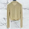 Kvinnor stickar Tees Women Hollow Out Knit Cardigan Runway Chic Gold Single Breasted Oneck Long Sleeve Slim Tops Lady Soft Shoulder Pad Jacket 230826