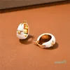 Guld präglad vit emaljring avancerad enkelhet Fashion Temperament Ear Clip Earrings for Women