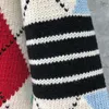 Erkek Sweaters Moda Erkekler Kadın İnce Hırgalar Giyim Kalın Argyle Beyaz Vncek Yün Sonbahar Kış Sıradan Palto 230826