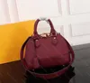 Sacs à main de designer Sac de luxe Alma BB Mini fourre-tout Sac à bandoulière de mode pour femmes Poignée en cuir Sacs de messager Lady Cross Body Résistant à l'usure Rivets Plaid