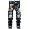 Jeans homme pantalon designer noir autocollants skinny lavage léger déchiré moto rock revival joggers vraies religions hommes 634597283