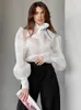 Blouses Femmes Chemises en maille blanche Femmes Sexy Voir à travers Bow Lace Up Bureau Dames Élégant Mode Manches Bouffantes Casual Lâche Mince Blouse