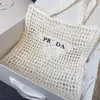 PRA Designer Bag Shoulder Bag Beach Bag Fashion Mesh Hollow Woven Shopping Bags for Summer Straw Tote Bag 230723 608