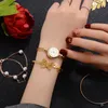 Orologi da polso da donna piccolo bracciale rigido in oro orologi di lusso orologio da polso al quarzo da donna in lega orologio casual di marca regalo Colck