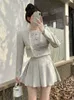 Tvådelad klänning högkvalitativ fransk vintage liten doft set kvinnor kort jacka kappa veckad kjol koreansk söt 2 kostymer 230828