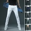 Herenbroeken Magere witte jeans voor heren Mode Casual Elastisch Katoen Slanke denimbroek Heren Merkkleding Zwart Grijs Kaki 230828