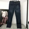 Jeans da uomo Autunno Mastermind Japan Pantaloni denim MMJ Dark Wind Skull Head Stampa Pantaloni semplici da strada a gamba dritta slim fit 230828