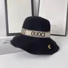 Diseñador de lujo Sombrero de cubo Sombreros de ala ancha Hombres famosos Mujeres Letras de marca Impresión Gorros tejidos a mano Ventilar Volante Sombrero de pescador Accesorios de moda