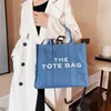 70% de réduction sur Baobao Women's 2023 nouveau et artistique lettre impression grande capacité simple mode messager toile sac à bandoulière