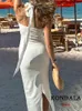 Swobodne sukienki Kondala seksowna biała, biała pusta pustka sukienka mody mody 2023 Summer Back Split Pochwa Kobieta elegancka impreza