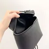 Mode nouveau favori portable goût discret ultra-doux couleur sac corps peau de vache est très résistant au sac à dos 23X32