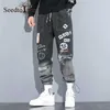 Jeans da uomo coreani stampati denim sciolto S-5XL pantaloni casual di grandi dimensioni pantaloni cargo hip-hop tuta HKD230829