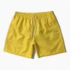 Mäns shorts kvartade byxor polyester strandfodrad sport surf