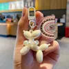 Cartoon Pearl Puppy KeyChain Söta AirPods hängande prydnads mobiltelefonfodral diy tillbehör bil hängande väska nyckelhållare gåvor