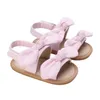 サンダルの女の子のキャンバス柔軟な非滑りのボウノット夏のカジュアルな平地幼児靴