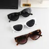 Mens Womens Sunglasses Designer Top 23YS Home's Novos Óculos de Sol Cat Eyes Moda Pequeno Quadro Óculos de Sol Online Moda Popular Ins Street Shoot