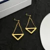 مصمم أسياد أسياد أسياد المثلث الذهبي للنساء المعلقات الحركية المجوهرات أزياء الأذن الفضية