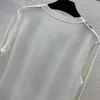 Diseñador Jumper Jersey Suéteres Mujer Seda Sarga Empalme Parte trasera Mezcla de lana Tela Cetro Semental Estampado Cuello redondo Manga larga Suéter de punto