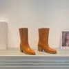 Half Western Boots Zipper مدببة بإصبع القدمين الكعك الكثيفة الكثيفة الجلدية المصممة النسائية المصممة للسيدات