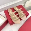 Sandalias planas de gelatina para mujer, chanclas con lazo en V, zapatos de playa con tachuelas, zapatillas con remaches, sandalias tipo Tanga desnudas, moda 35-43