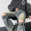 Jeans da uomo High Street dritto tinta unita Vibrazione Design streetwear Senso Hiphop Foro lavato a vita media Pantaloni larghi a gamba larga 230828