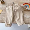 Byxor koreanska version 0-6 år gammal barns vår mode enkel retro fast färg casual byxor män och kvinnors baby