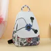 Bolsas escolares atacado fábrica vintage string apliques mochilas femininas! impressões agradáveis multi-zíperes backrack senhora lona backruck