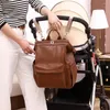 Skolväskor 2023 Natural Cowskin Pu Leather Mommy Bag Fashion Trend Mother and Baby Waterproof Lightweight Women Ryggsäck