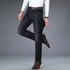 Klasyczne męskie antykradzieżowe dżinsy z guziki jesień jesień zima nowe biznes luźne dżinsowe spodnie męskie marka swobodne spodnie HKD230829