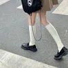 Femmes chaussettes JK haut genou solide coton longue mode féminine tricot rayure bas jambe robe Calcetine Medias