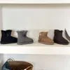 2024 Nouvelles bottes enfants bottes Australie neige designer enfants chaussures hiver classique mini botte bouton noeud papillon bébé garçons fille bottines enfant fourrure daim