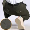 Męskie spodnie męskie ładunki oddychające trwałe prosto z wieloma kieszeniami Wygodne spodnie w połowie talii do swobodnej sprężyny