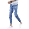 Koreansk stil mitten av ris-dragkedja flugfickor män smala passande mager jeans rippade hål smala fit denim pants streetwear hkd230829