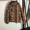 Down Jackets Designer Puffer Jacka Women Coat Contrast Plaid DrawString Midjeband Långärmad huva Bomull Rockar Designers Winter Jackets Womens 55