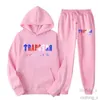 Survêtement Trapstar Marque Imprimé Sportswear T-shirts pour hommes 16 couleurs Chaud Deux pièces Ensemble Sweat à capuche ample Pantalon Jogging Noir Blanc Solide Couleur Rose F1lq