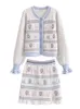 Kvinnor S stickor Tees Sweet Women Autumn White Blue Flower Sticked Flare Sleeve Cardigan High midje Front Slit Wave Hem mini kjol Matchning Set 230829