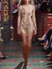 Robes décontractées de haute qualité femmes sexy léopard imprimé dos nu à manches longues mince mini robe mode dame taille asymétrique courte