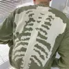 Мужчины негабаритные свитеры повреждение дыра Зеленый скелет для печени вязаные свитера Женские женские улицы Свободный винтажный свитер Q230830